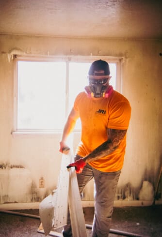 JRI Demolition team tearing down damaged walls in Boise Idaho